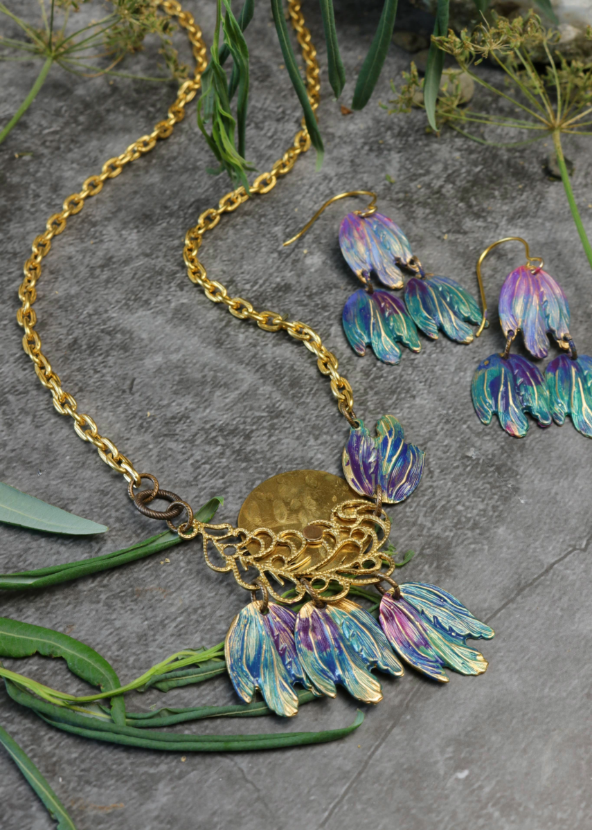 gold necklace and earrings