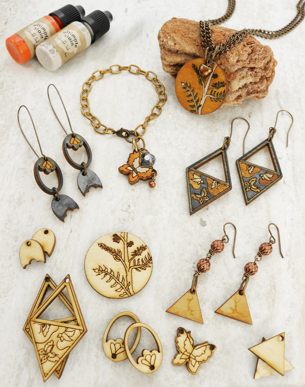 Hand-stained jewelry and paint bottles