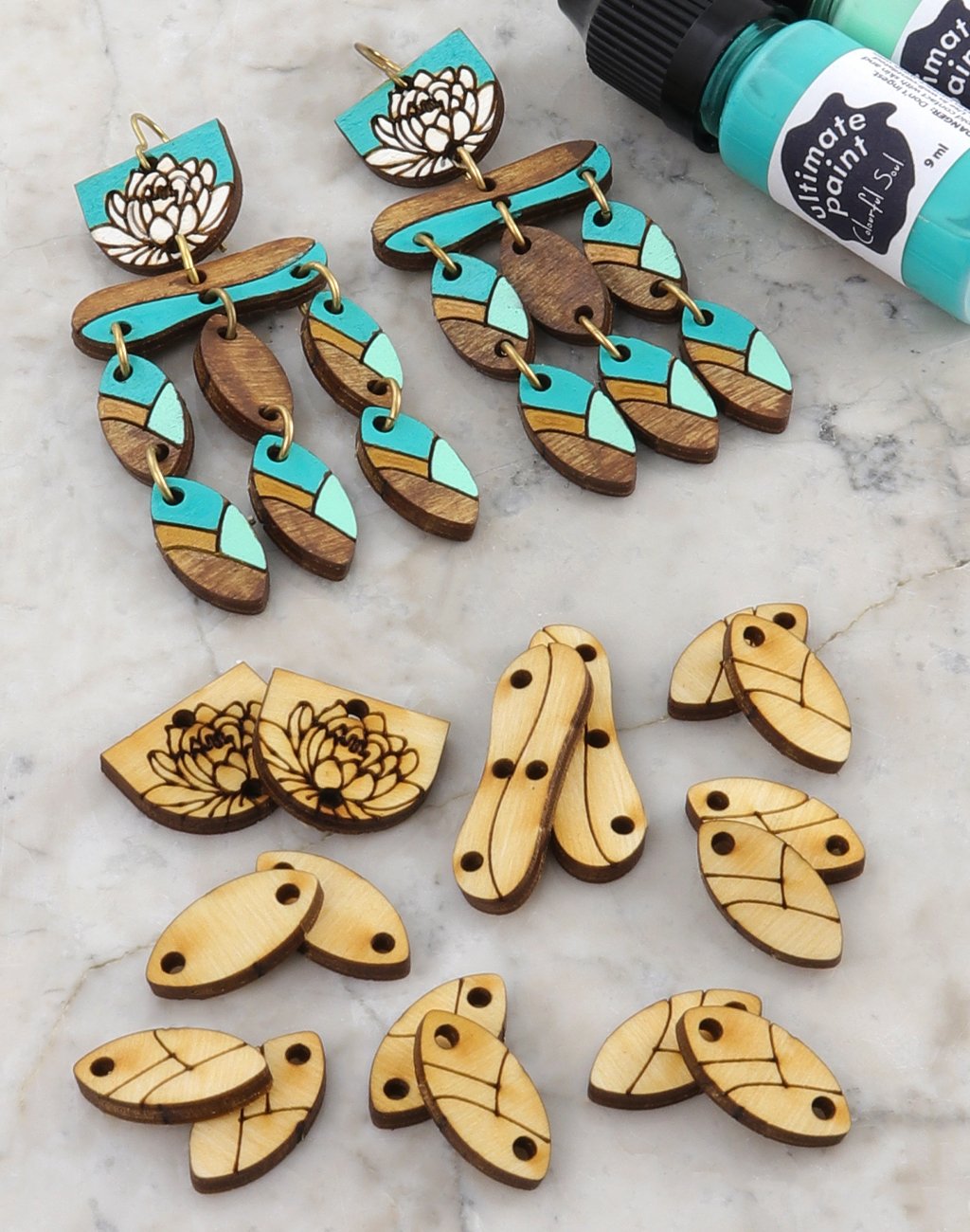 Teal and wood earrings with floral design, testcs3