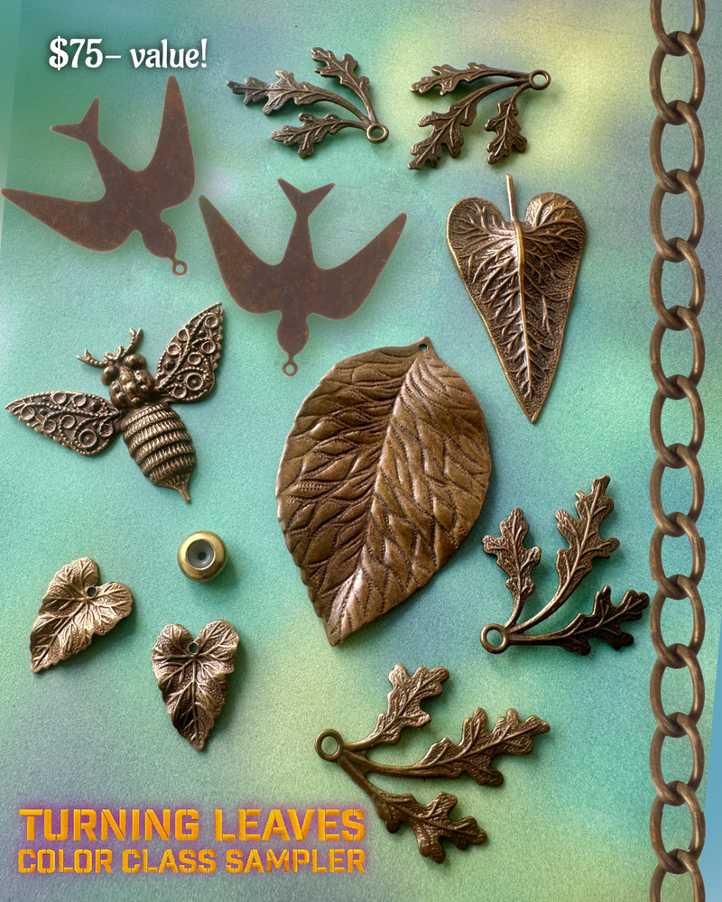 Metal leaf and bird charms with chain.