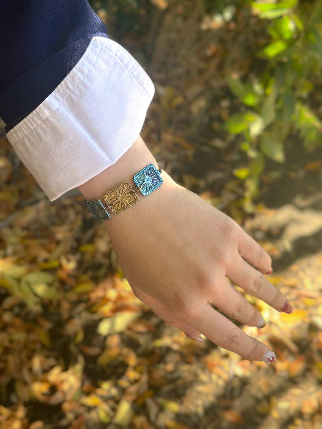 Bracelet on wrist.