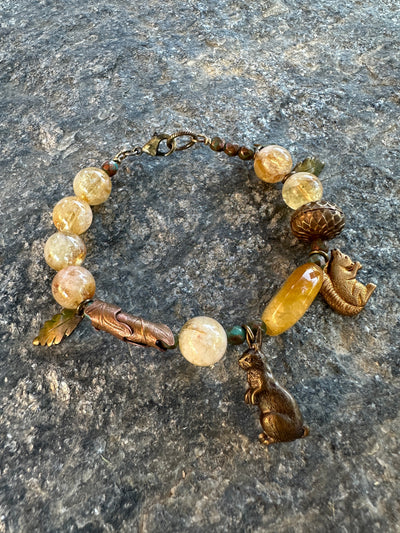 Beaded bracelet with charms.