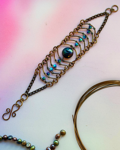 Handmade artisan bracelet with blue beads
