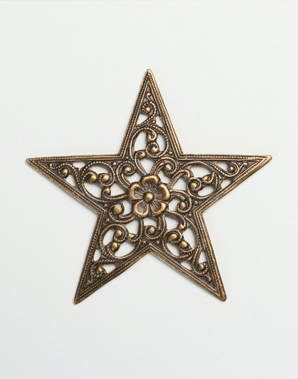 Decorative filigree star on white background