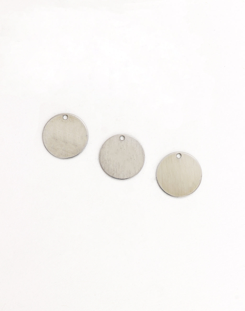 PT082 - Three blank metal circle tags