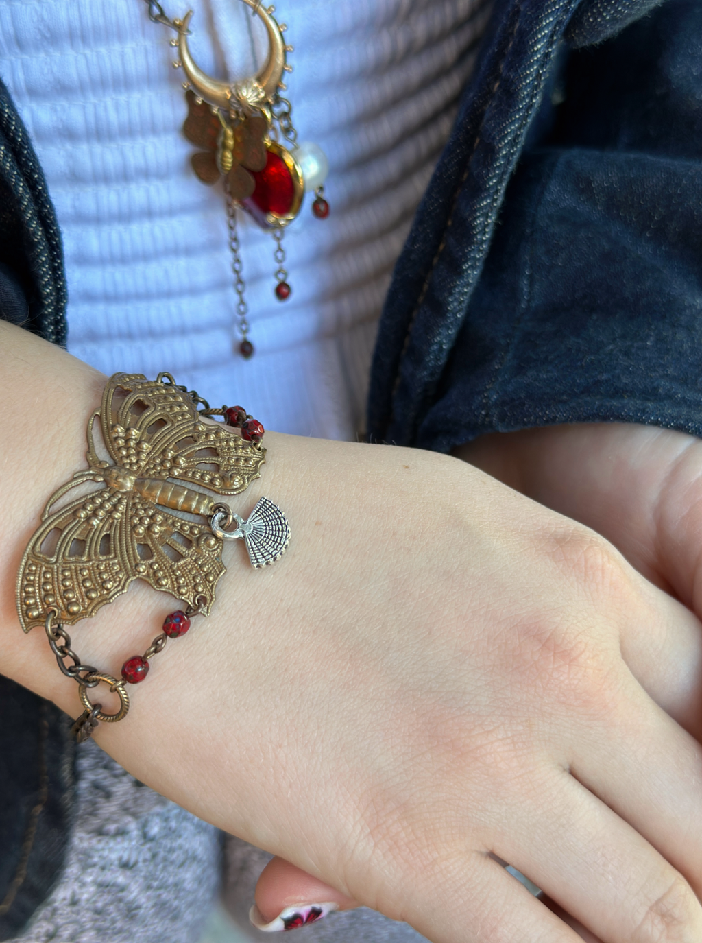 Butterfly bracelet and red gemstone jewelry