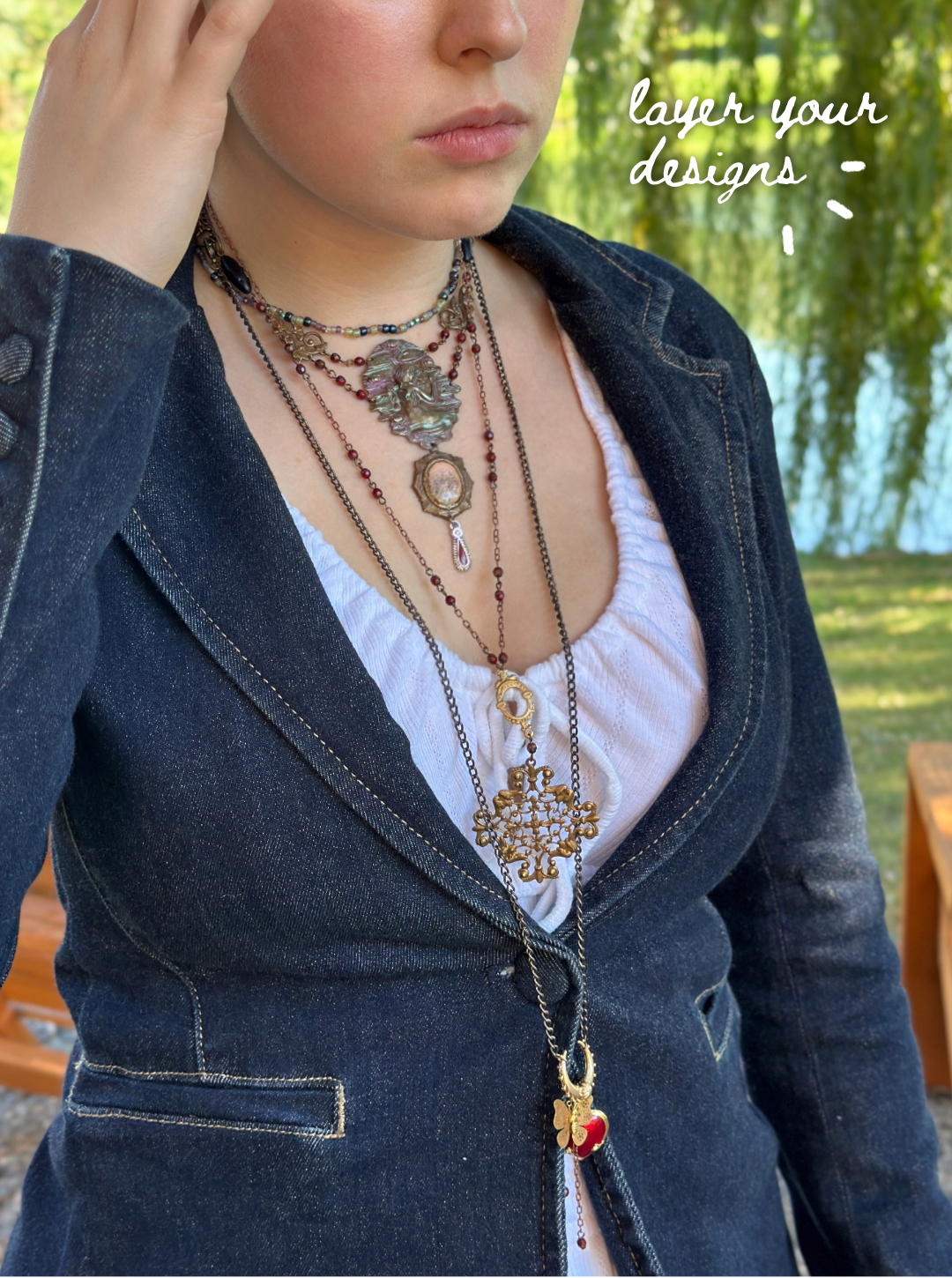 Woman wearing layered necklaces, design inspiration