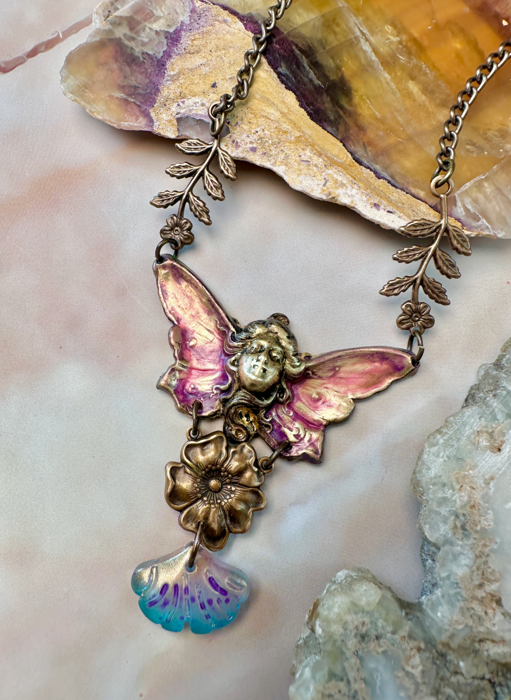 Fairy necklace with butterfly wings and floral details