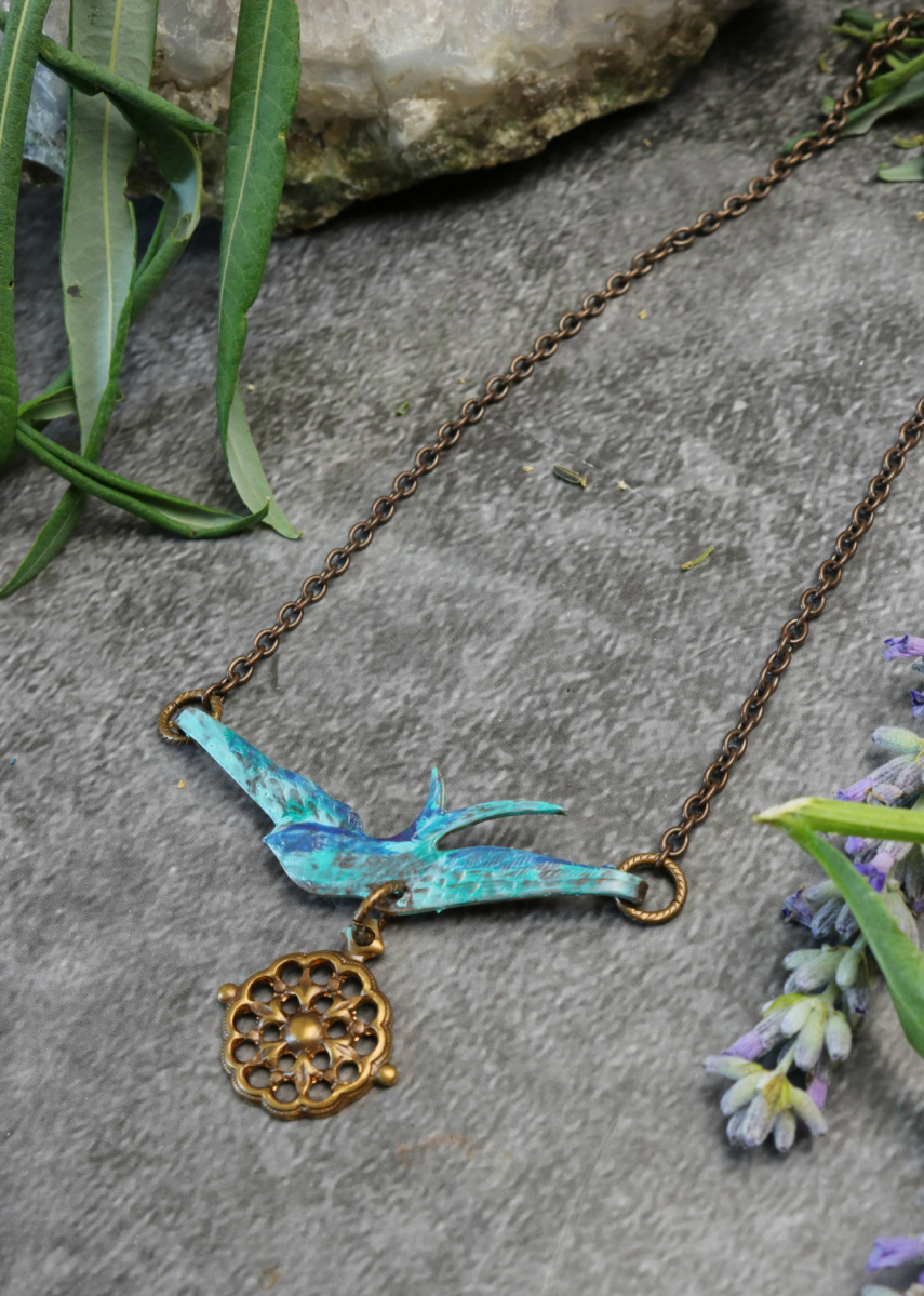 Turquoise bird pendant necklace