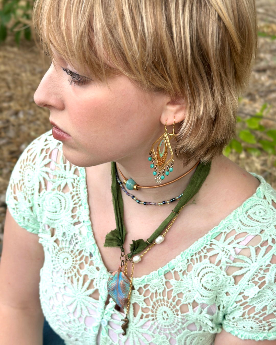Woman wearing trend-focused jewelry (segment 11)