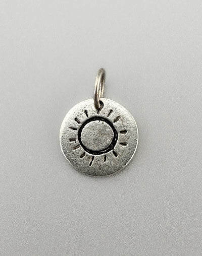 Sun charm pendant