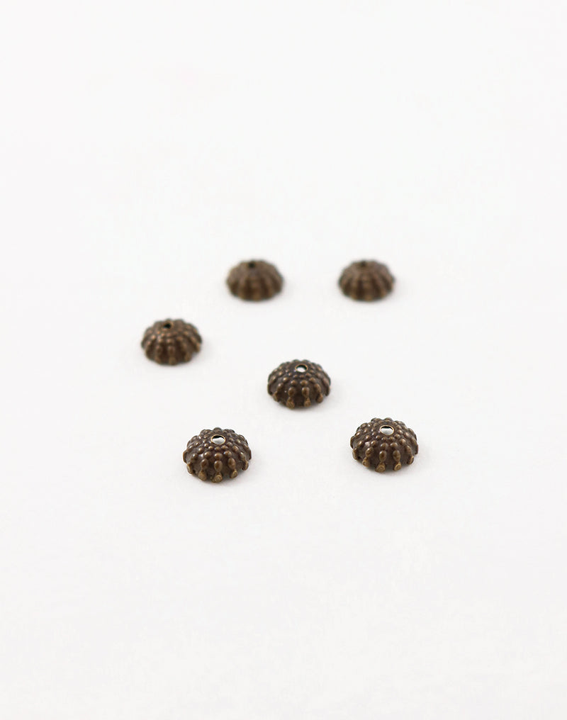 BC150 bead caps on white background