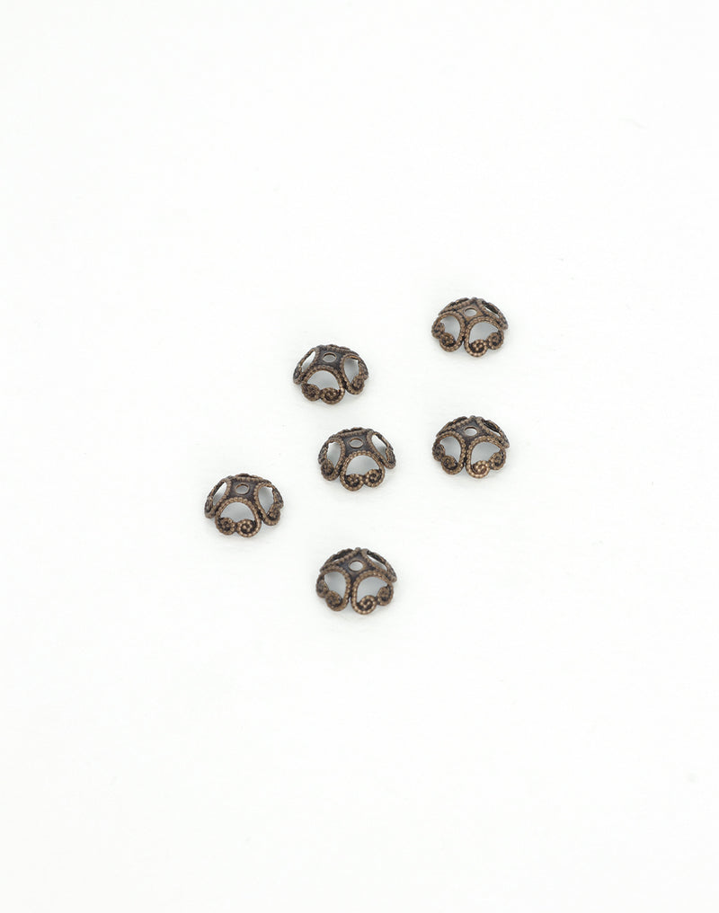 BC50 Antique bead caps on white