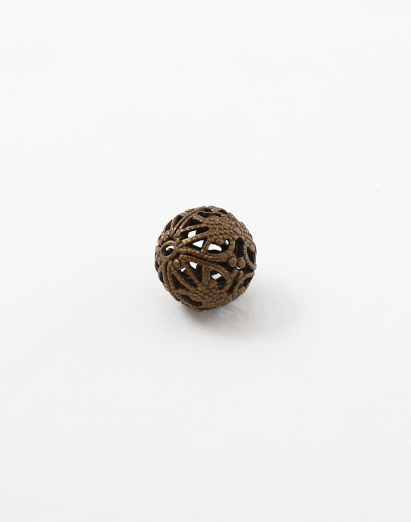 Decorative pierced ball on white background