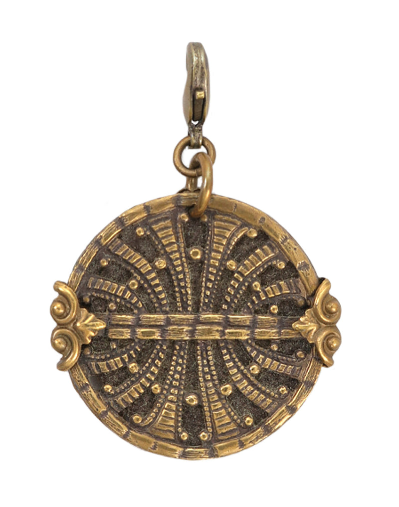 Ornate gold pendant charm