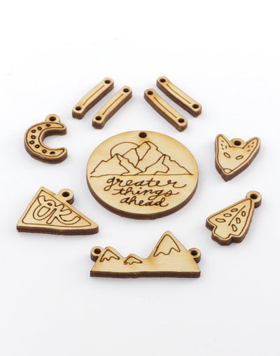 Laser cut wooden charms, greater things ahead
