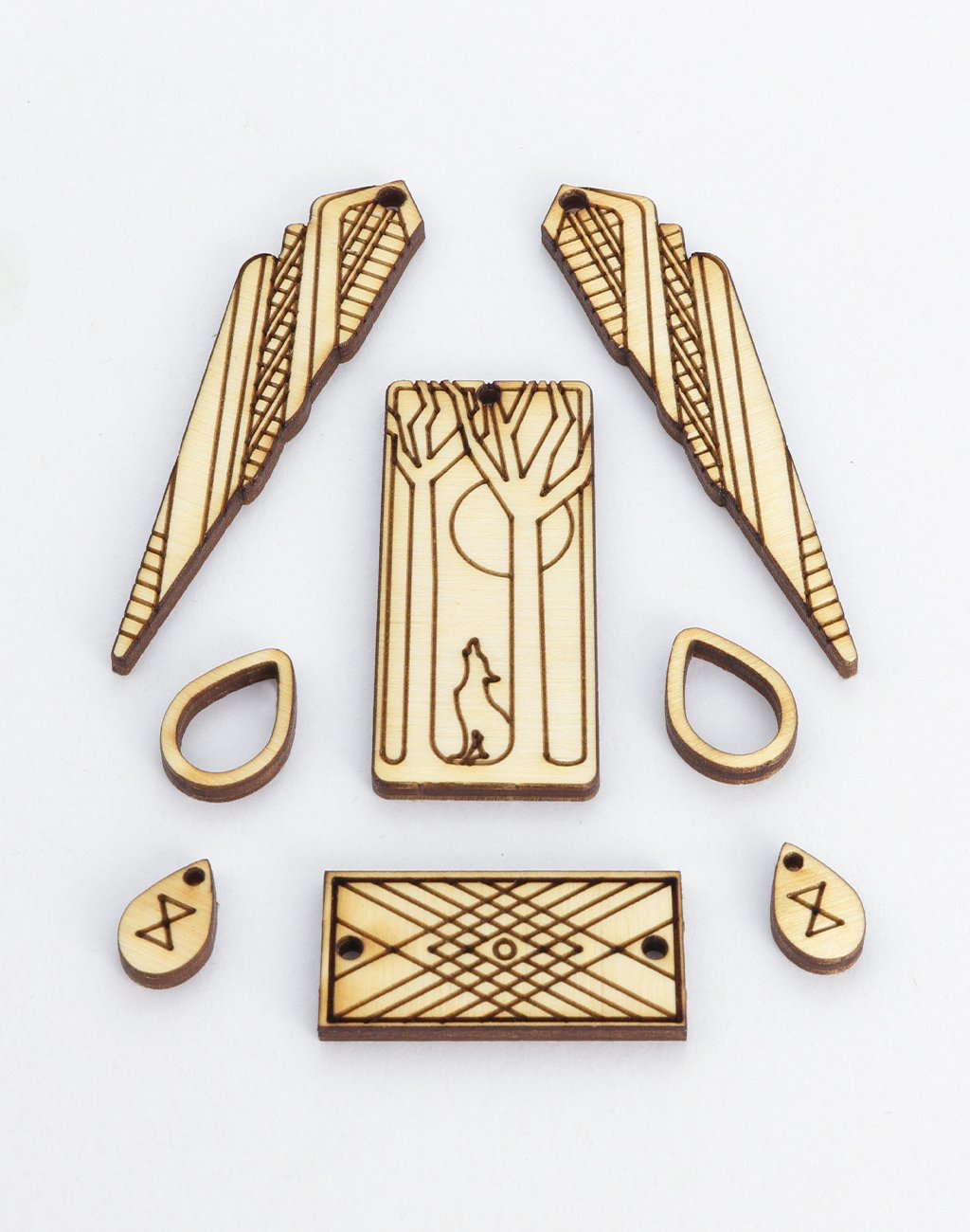 CSWMPD-001-A Wooden jewelry set with wolf, trees, and geometric designs