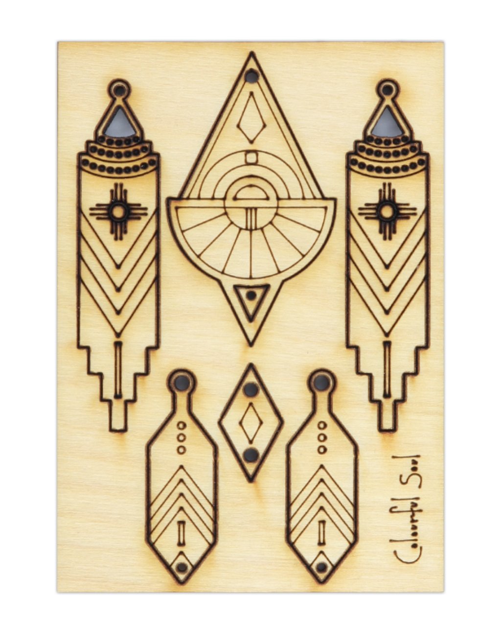 Wooden earrings with geometric designs.