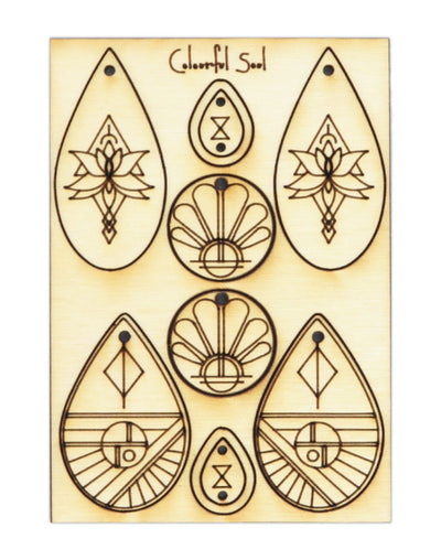 Colorful Soul earring cutouts in wood