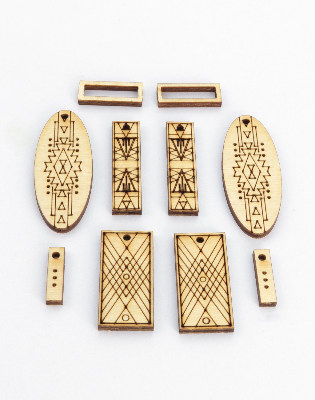 Laser-cut wood jewelry components with geometric design