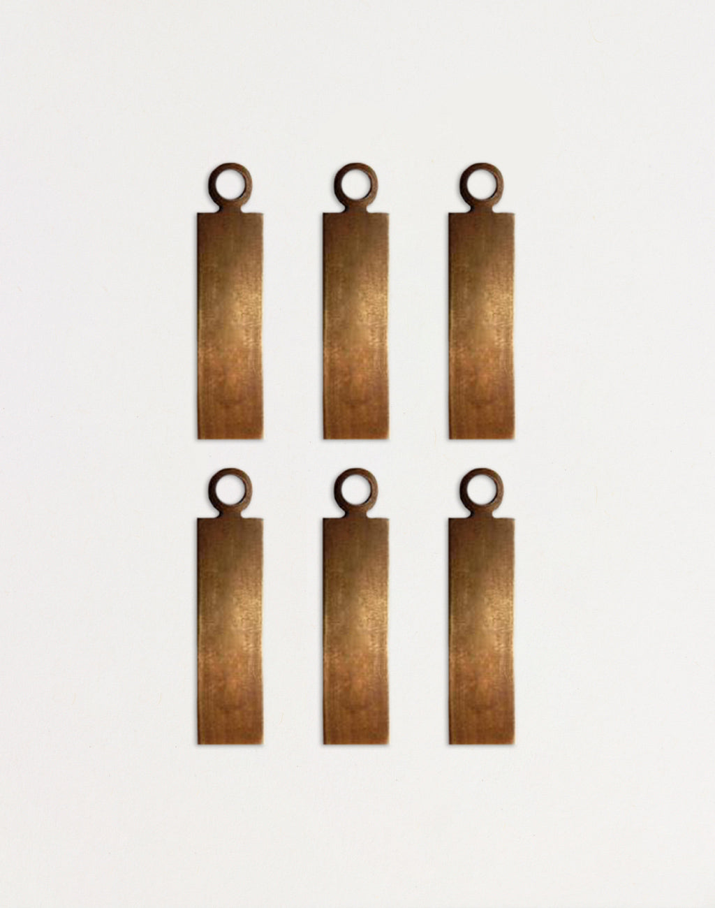 Six brass tags - DP0005