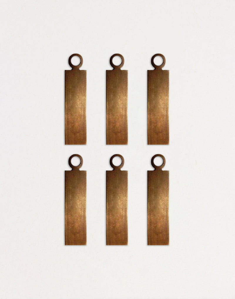 Six brass tags - DP0005