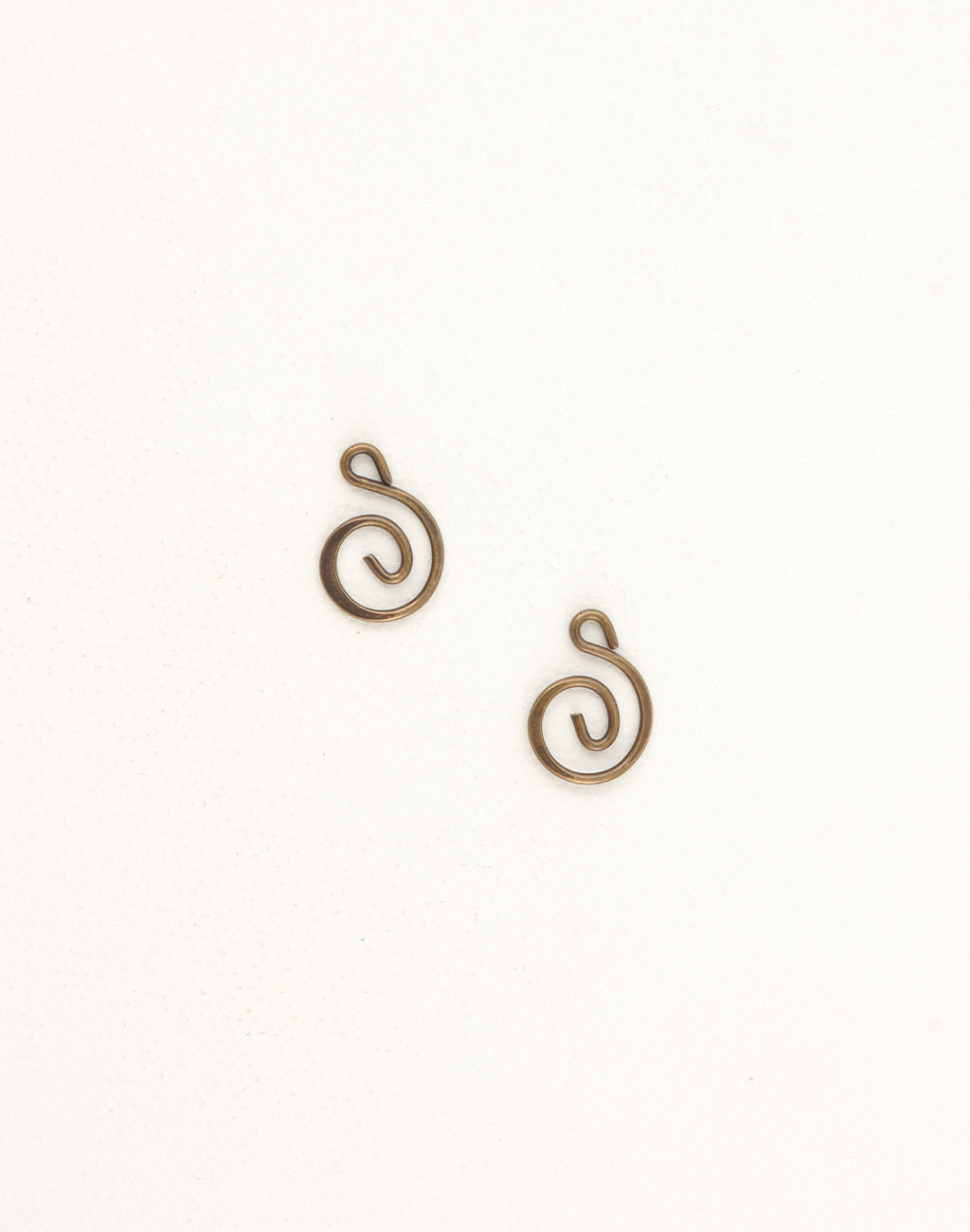 Pair of small spiral charms