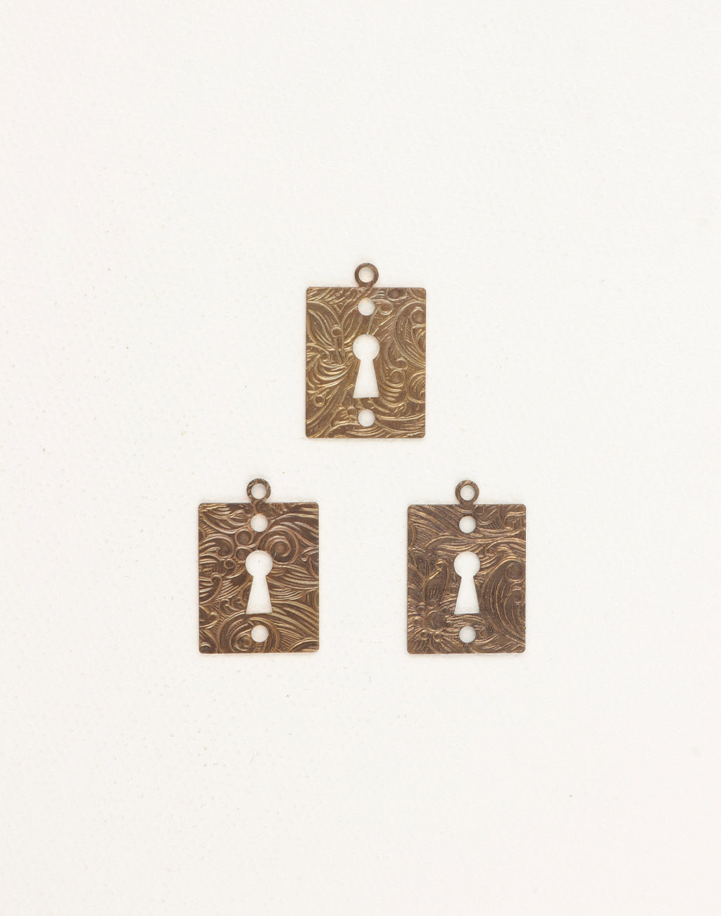 DP411 keyhole charms, decorative metal pendants.