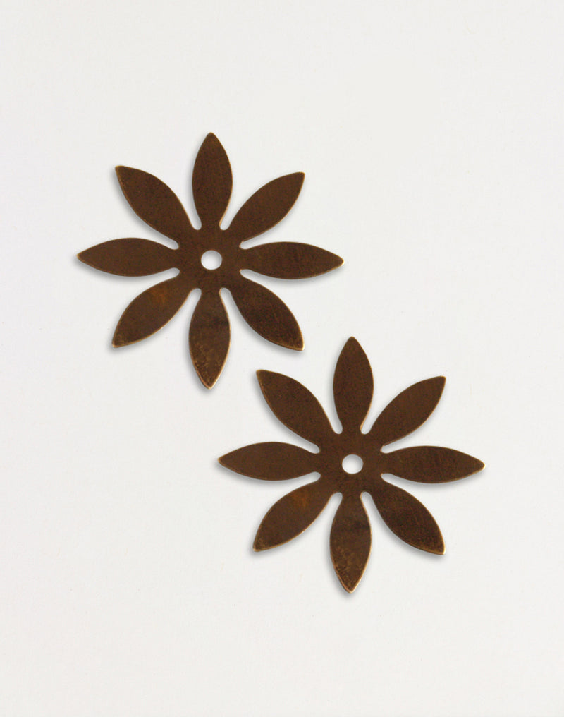 Pair of brown metal flower coasters