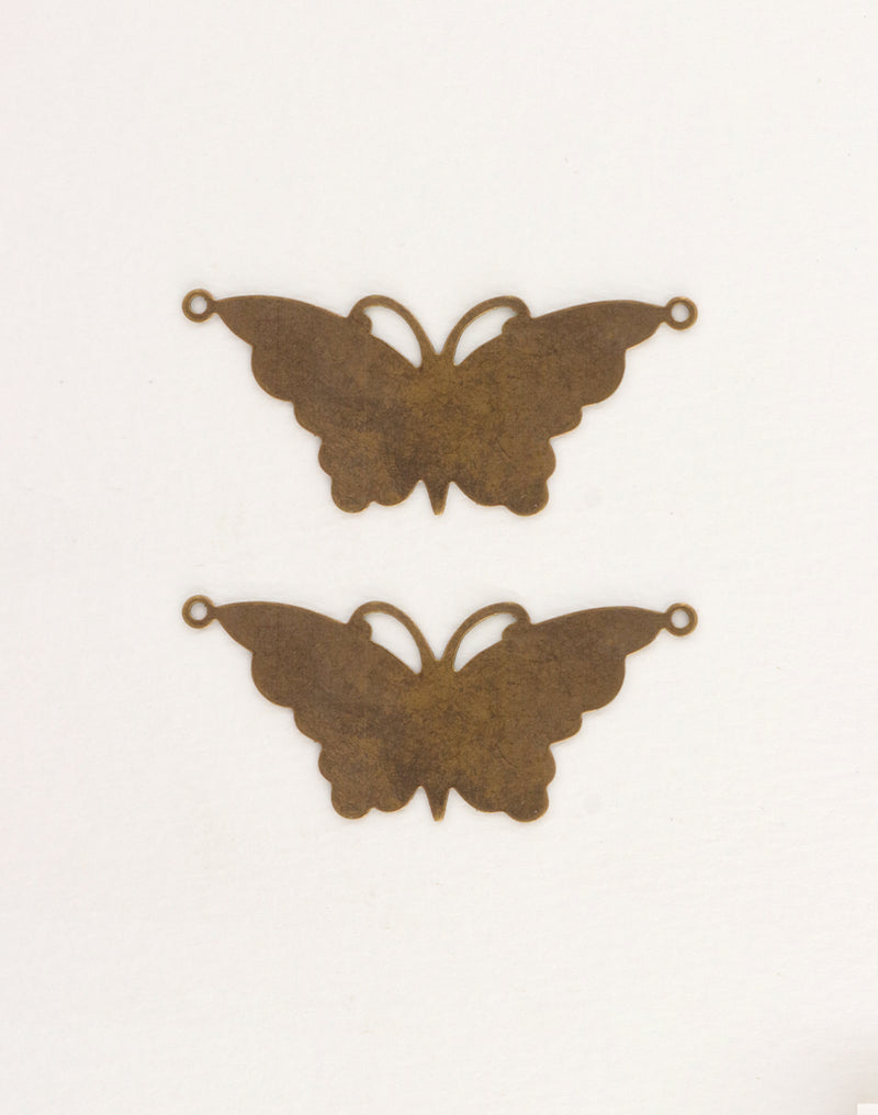 Two bronze butterfly charms for jewelry making.