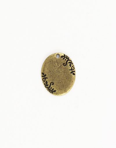PT153-270 Antique brass oval charm with floral detail