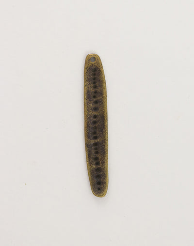 Elongated, speckled pendant