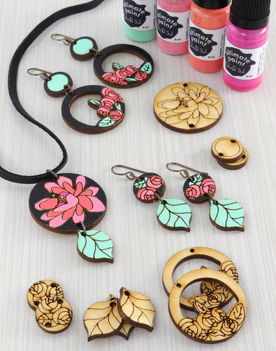 Wooden jewelry with patina and pink floral designs