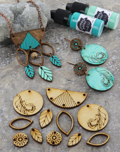 Wooden jewelry and teal paint